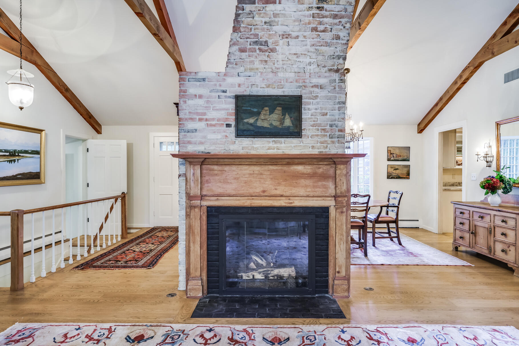 72 Hathaway Road Osterville, MA 02655 - Photo 8 of 40 a living room with furniture and a fireplace