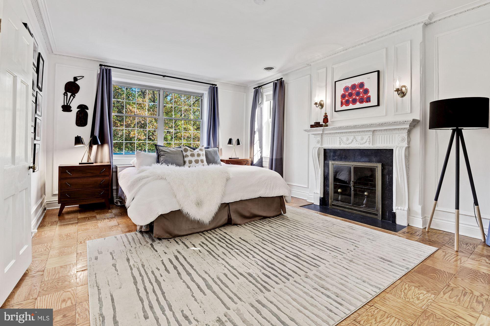 3230 Woodley Road Northwest Washington, DC 20008 - Photo 27 of 55 Master Bedroom with wood burning fireplace