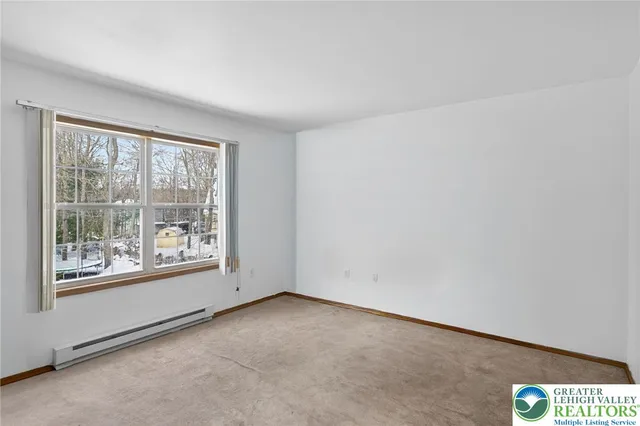 an empty room with a window