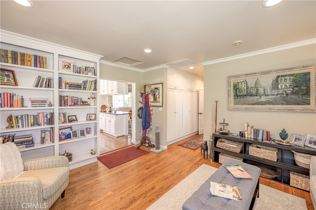 1865 Midwick Drive Altadena, CA 91001 - Photo 12 of 30 a bedroom with furniture and a book shelf