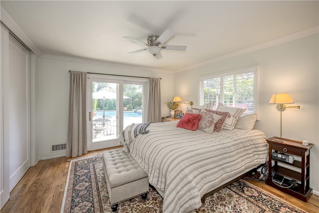 1865 Midwick Drive Altadena, CA 91001 - Photo 13 of 30 a bedroom with a large bed and a window