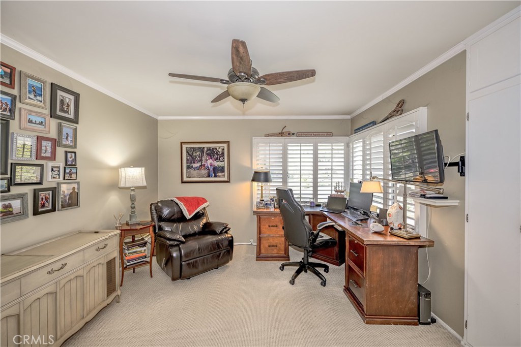 1865 Midwick Drive Altadena, CA 91001 - Photo 18 of 30 a living room with furniture and a flat screen tv