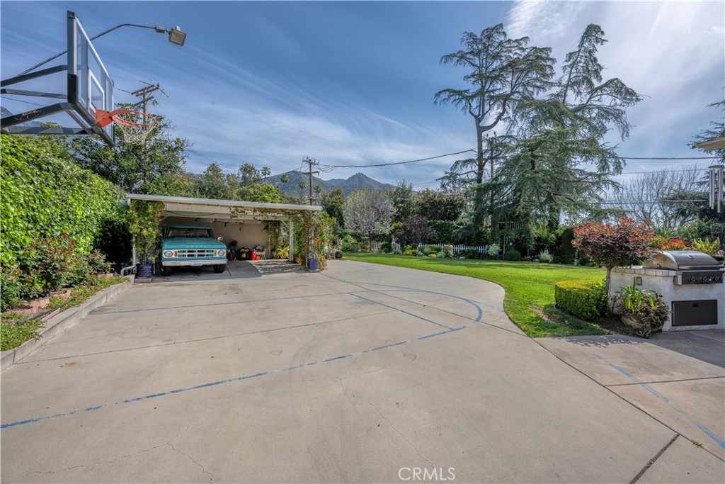1865 Midwick Drive Altadena, CA 91001 - Photo 21 of 30 a car parked on the side of the road