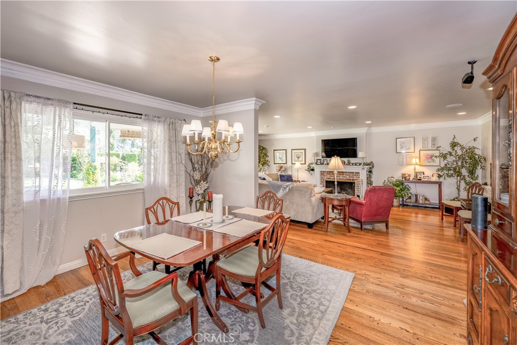 1865 Midwick Drive Altadena, CA 91001 - Photo 8 of 30 a view of a dining room with furniture window and wooden floor