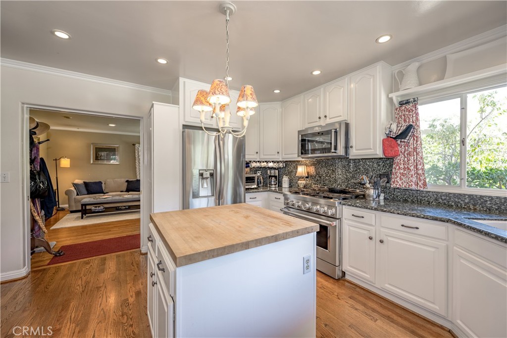 1865 Midwick Drive Altadena, CA 91001 - Photo 10 of 30 a kitchen with granite countertop a stove oven and refrigerator