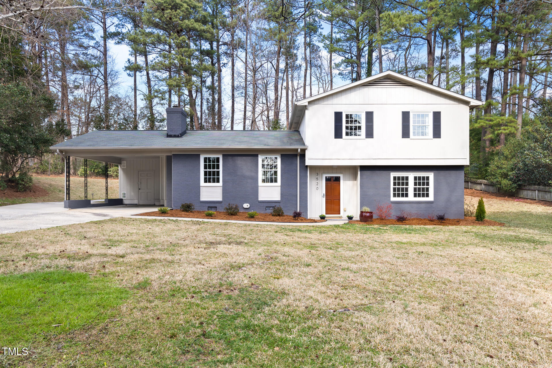 3520 Winding Way Durham, NC 27707 - Photo 1 of 26 a front view of a house with a yard