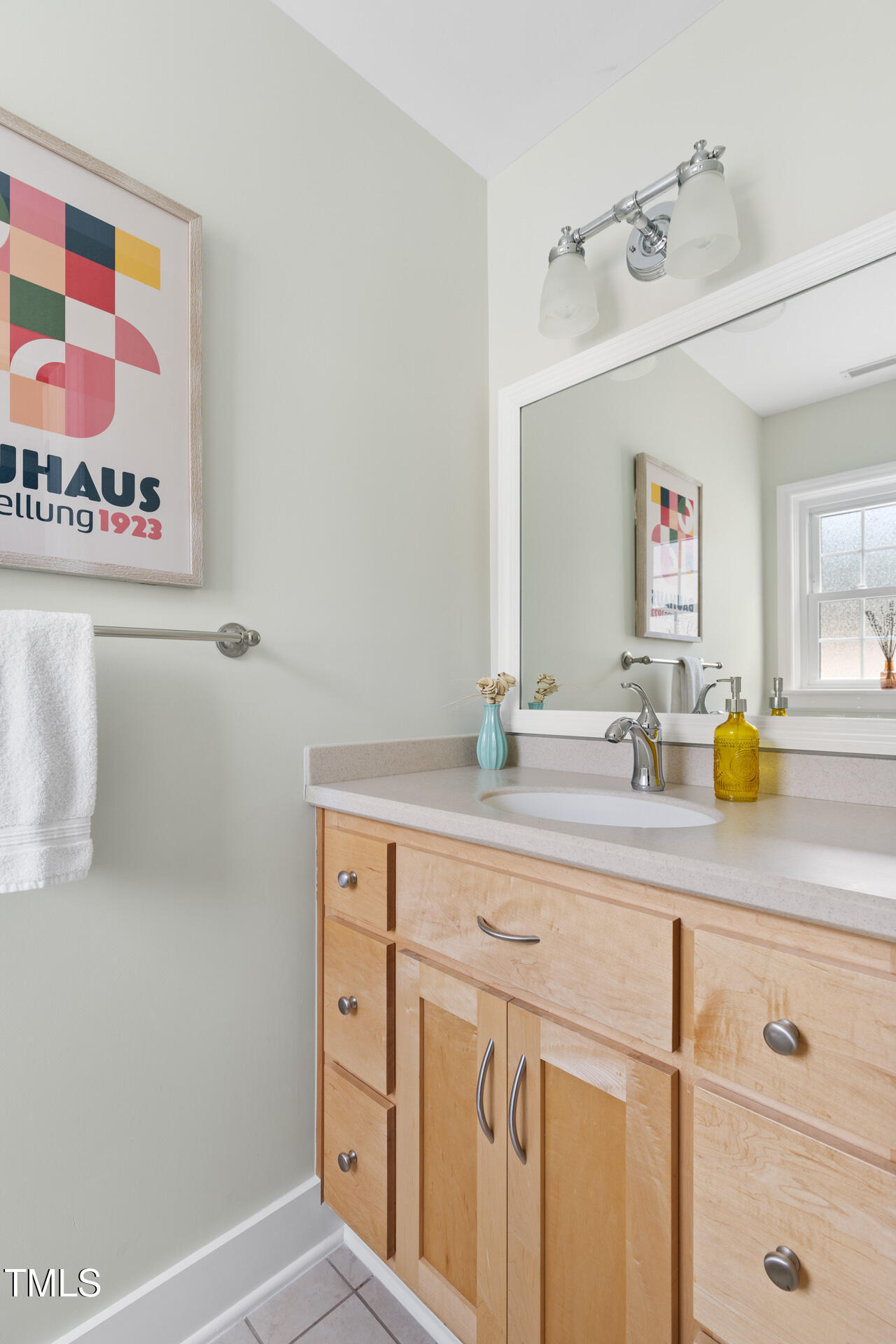 3520 Winding Way Durham, NC 27707 - Photo 12 of 26 a bathroom with a sink and a mirror