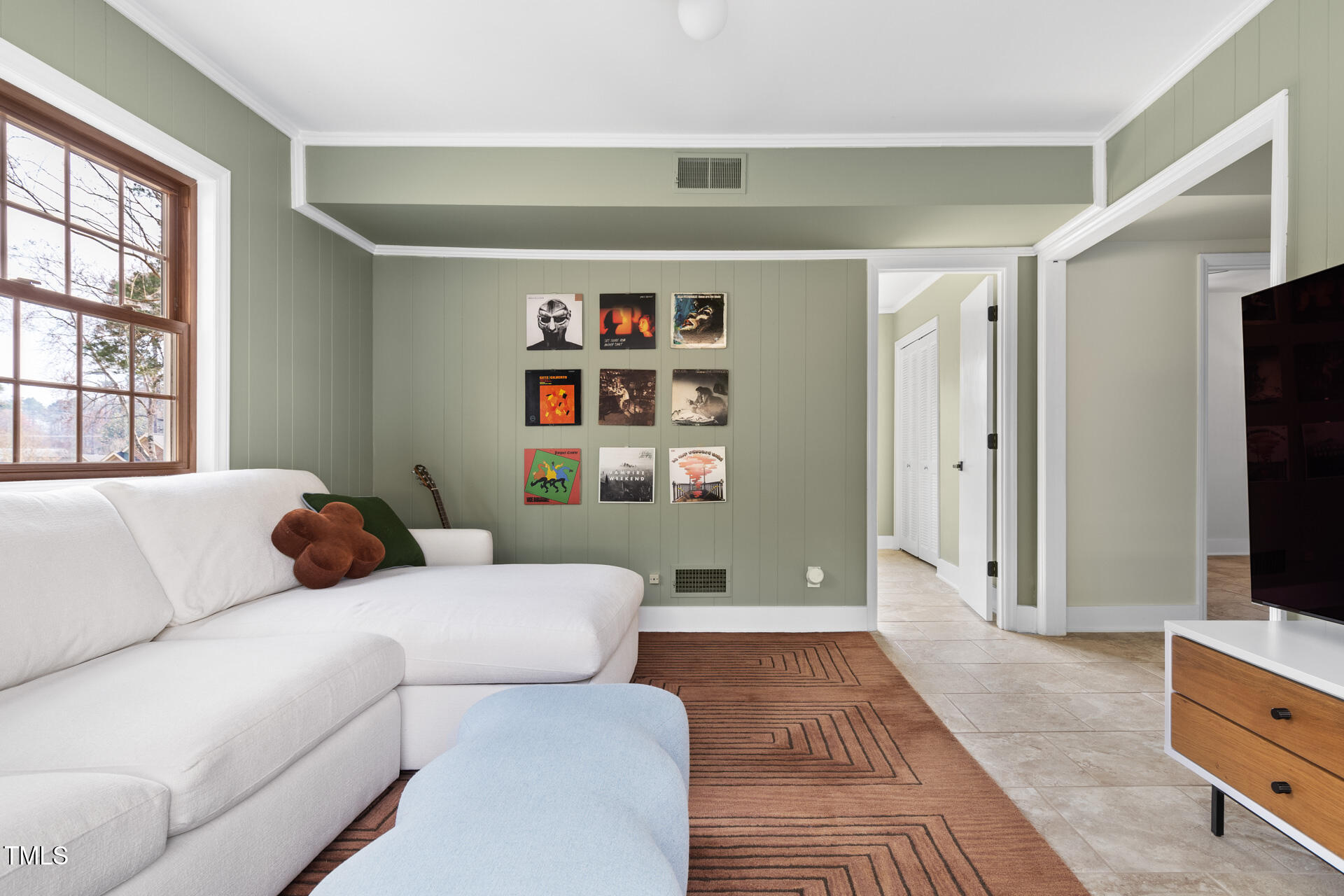 3520 Winding Way Durham, NC 27707 - Photo 15 of 26 a living room with furniture and a flat screen tv