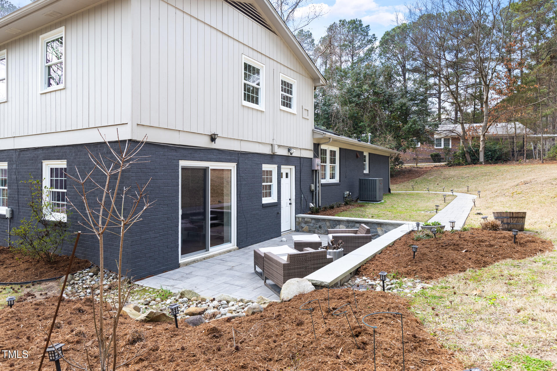 3520 Winding Way Durham, NC 27707 - Photo 23 of 26 a front view of a house with garden