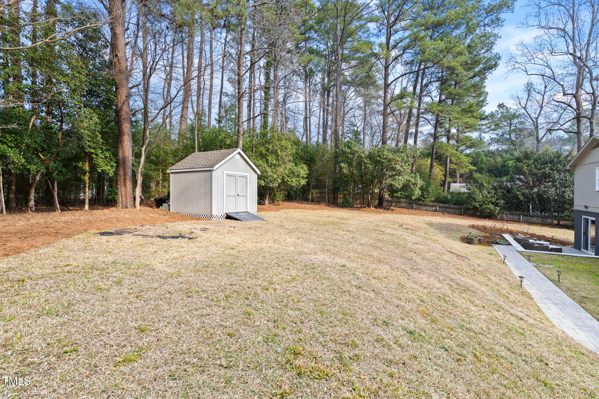 3520 Winding Way Durham, NC 27707 - Photo 25 of 26 a house with trees in front of it