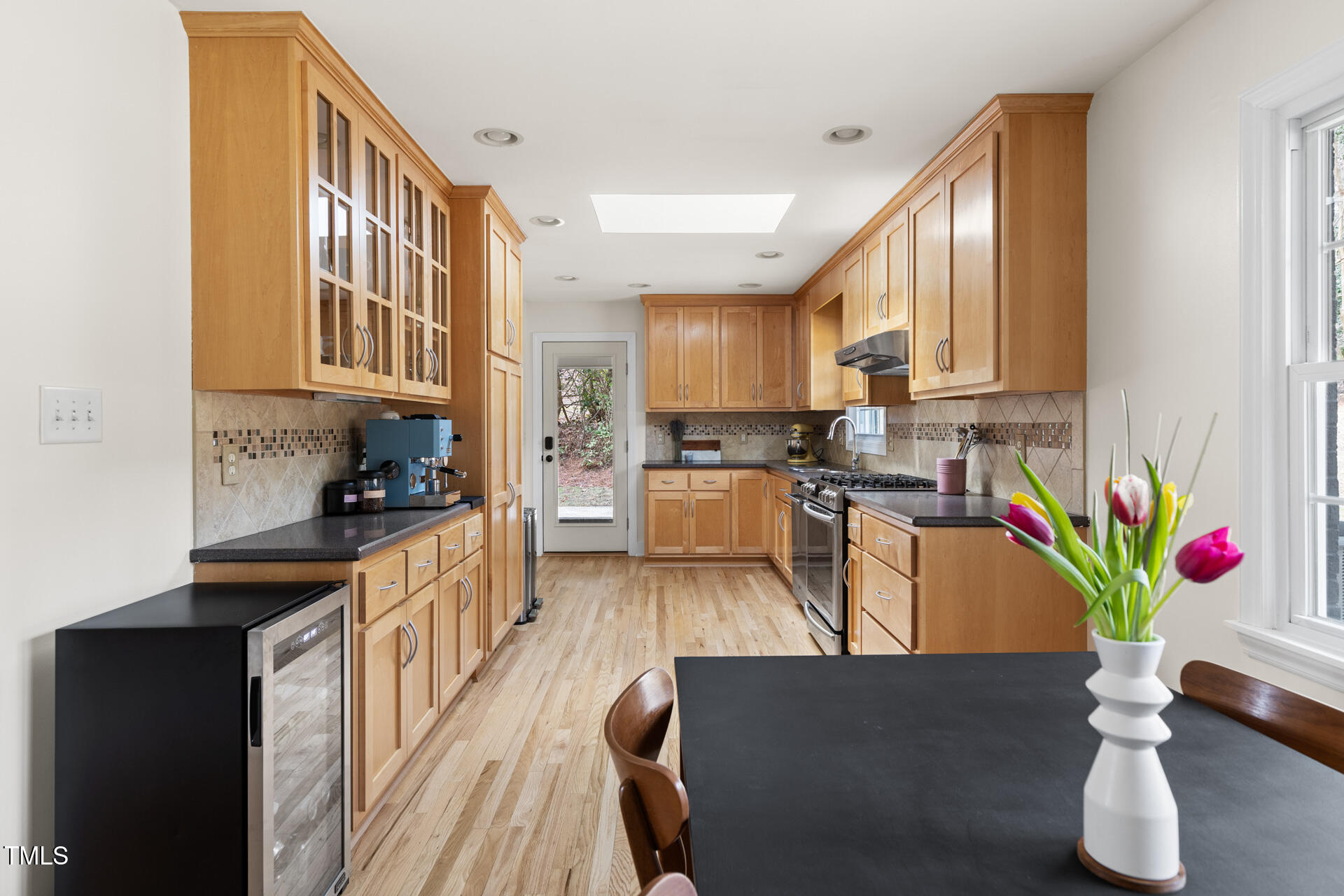 3520 Winding Way Durham, NC 27707 - Photo 8 of 26 a kitchen with stainless steel appliances granite countertop a refrigerator a stove and a sink