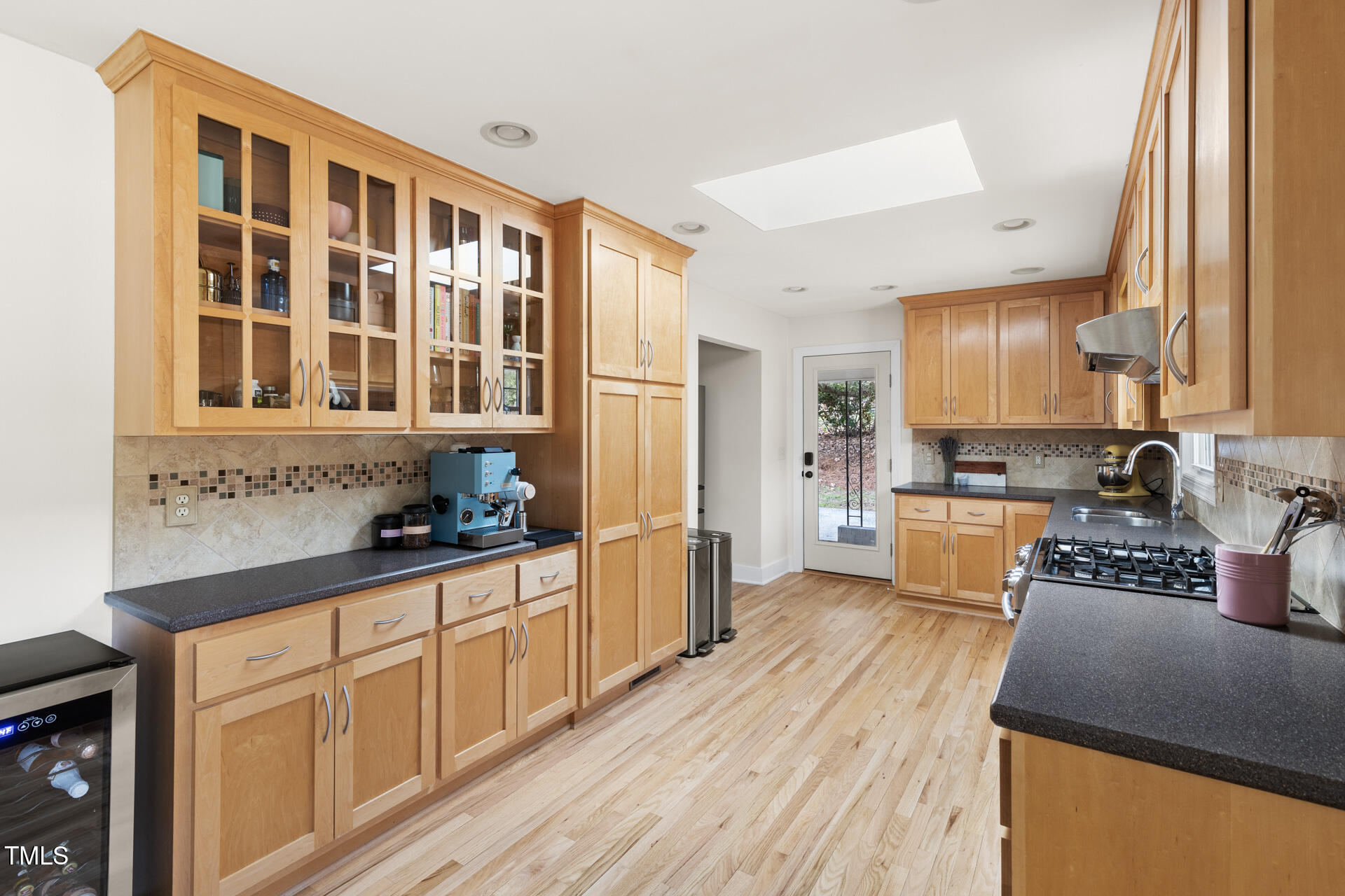 3520 Winding Way Durham, NC 27707 - Photo 9 of 26 a kitchen with stainless steel appliances granite countertop a stove and a sink