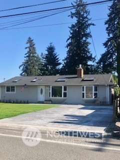 218 105th Street Southeast Everett, WA 98208 - Photo 1 of 12 front view of a house with a patio