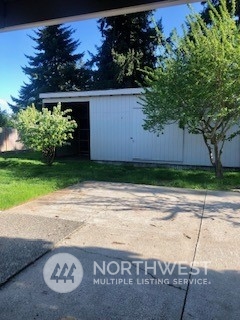 218 105th Street Southeast Everett, WA 98208 - Photo 8 of 12 a view of a street with a trees