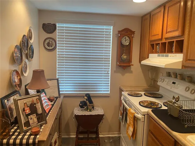 a room that has a bed and a chair in it