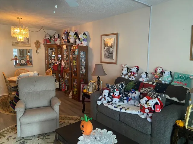 a living room filled with furniture and a couch