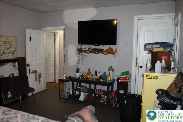 a view of a closet with storage