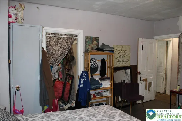 a kitchen with granite countertop a stove and a refrigerator