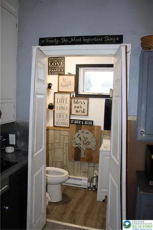 a bathroom with a toilet