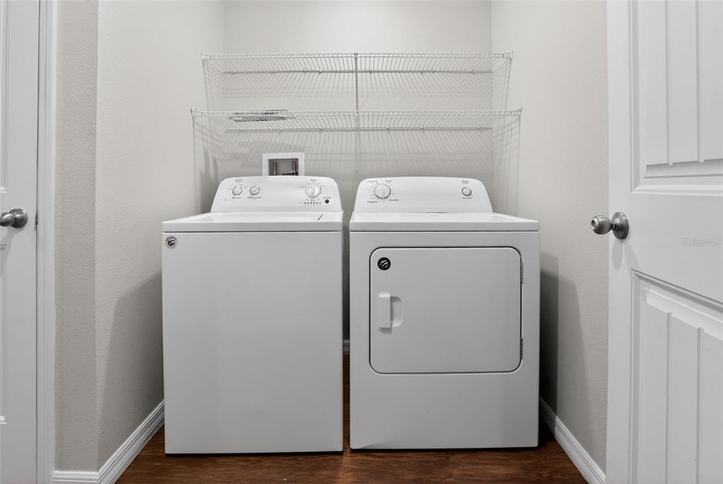 46 Sea Trail Palm Coast, FL 32164 - Photo 19 of 21 a utility room with dryer and washer