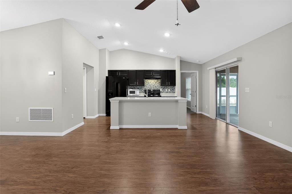 46 Sea Trail Palm Coast, FL 32164 - Photo 3 of 21 a view of kitchen with sink and wooden floor