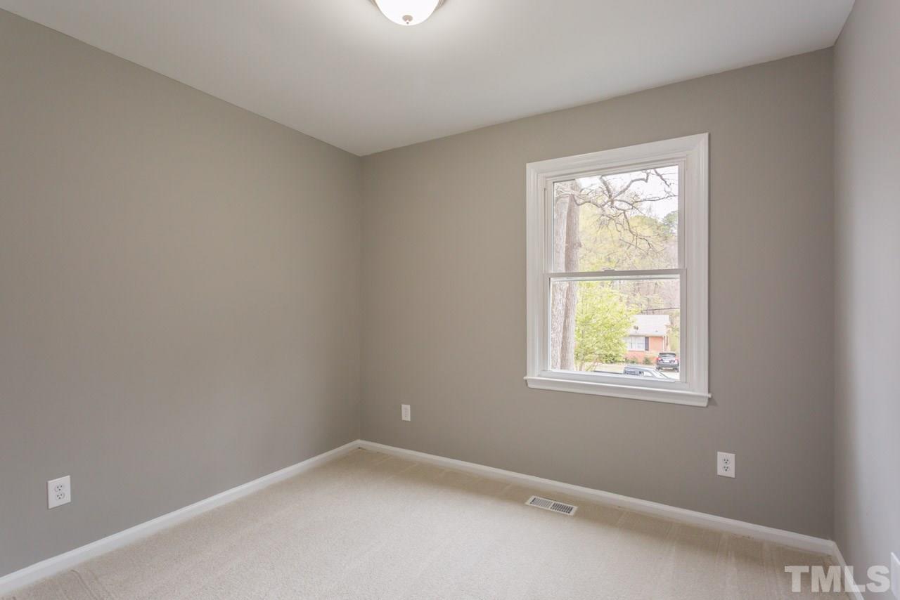 3822 Corwin Road Garner, NC 27529 - Photo 12 of 25 an empty room with a window