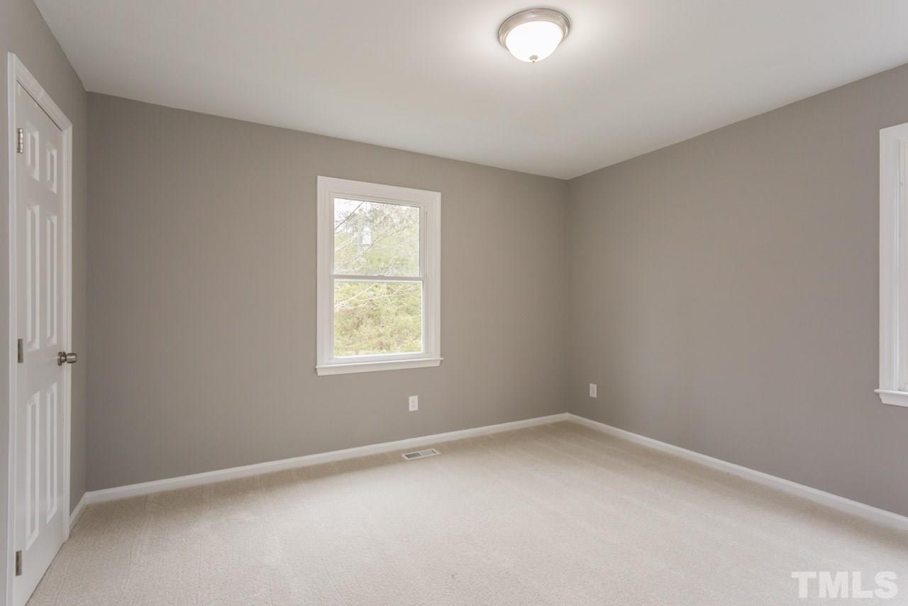 3822 Corwin Road Garner, NC 27529 - Photo 16 of 25 an empty room with a window