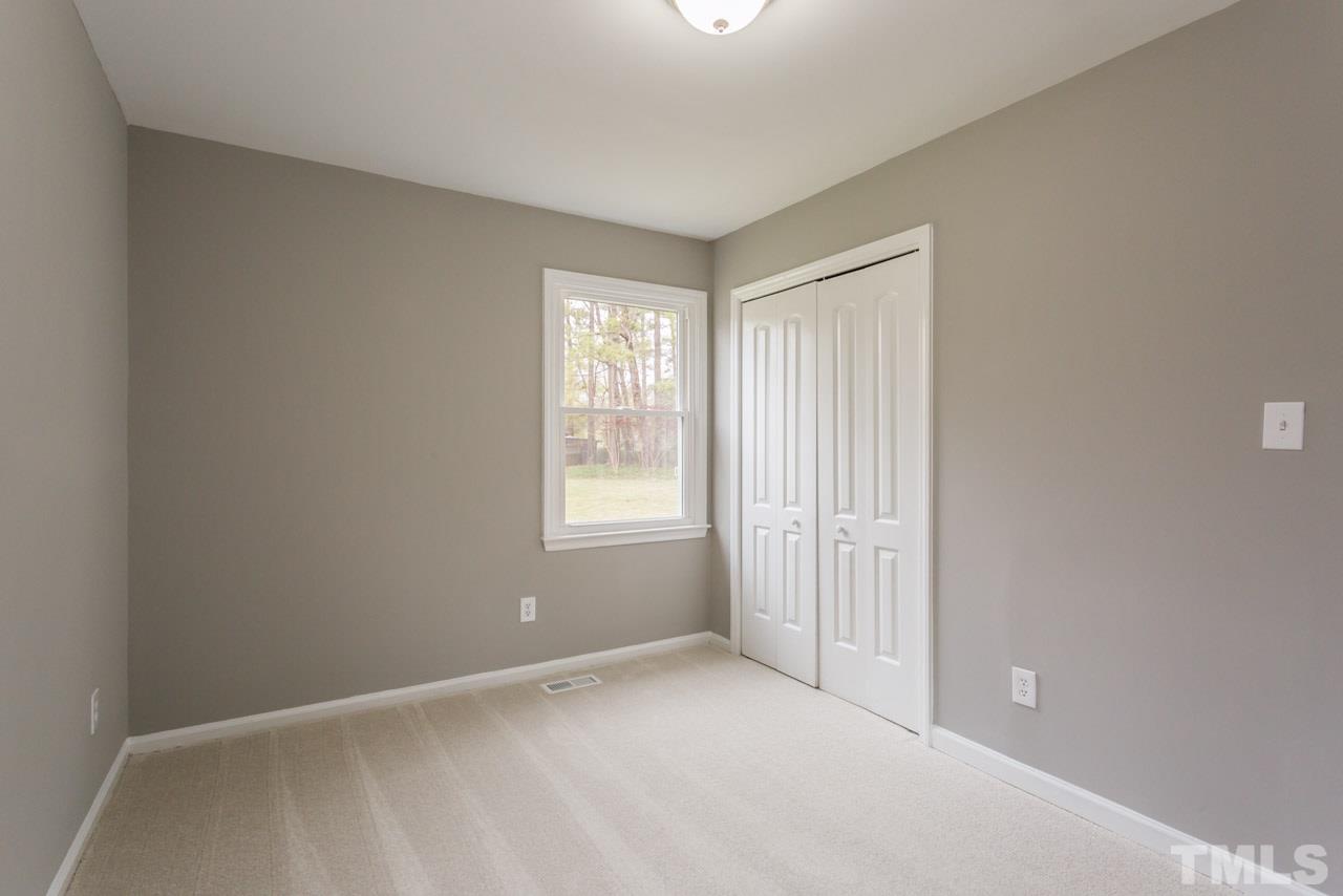 3822 Corwin Road Garner, NC 27529 - Photo 18 of 25 an empty room with windows