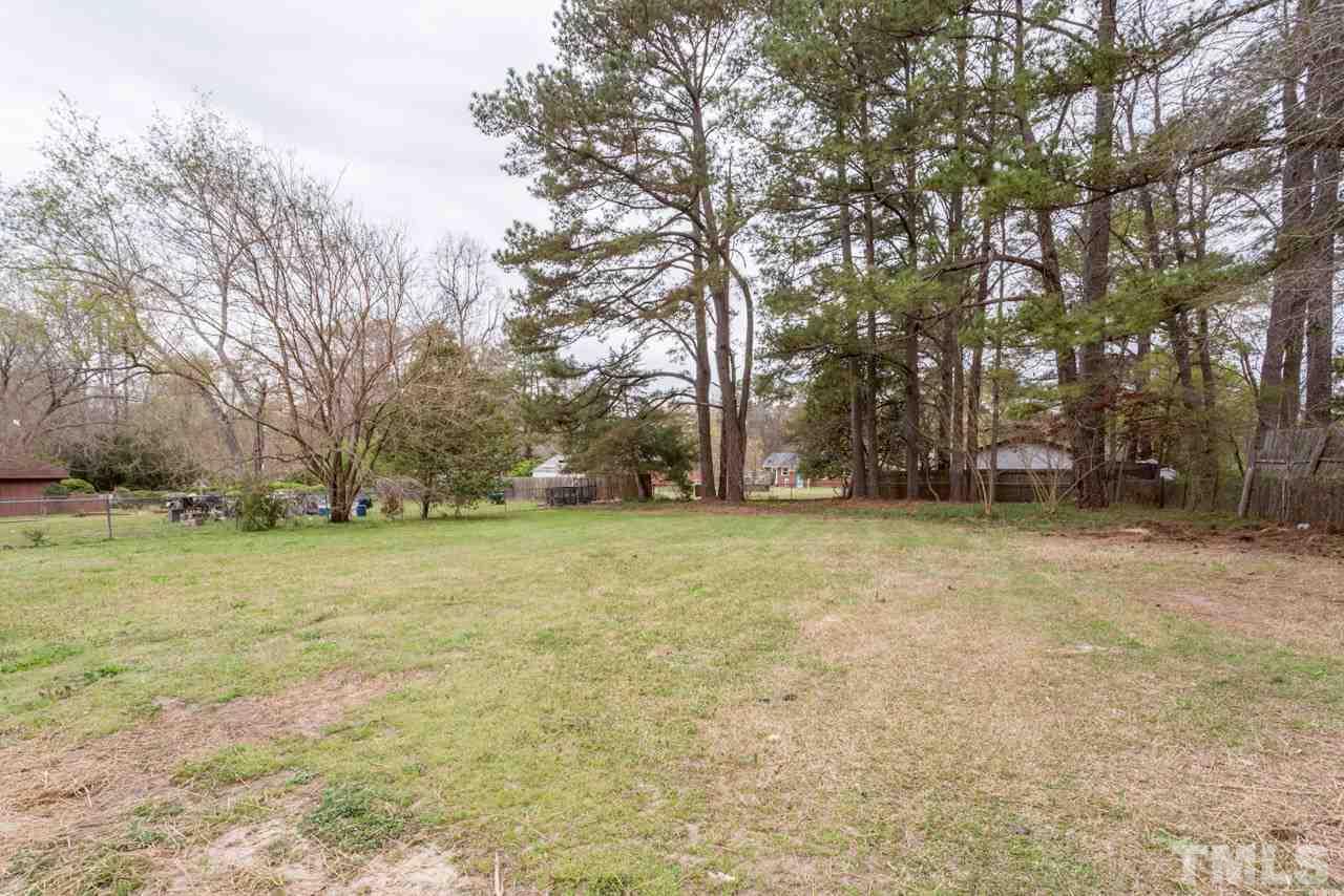 3822 Corwin Road Garner, NC 27529 - Photo 24 of 25 a fire hydrant in the middle of a field