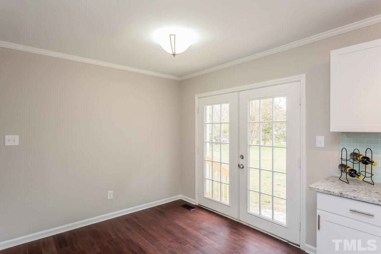 3822 Corwin Road Garner, NC 27529 - Photo 4 of 25 an empty room with windows