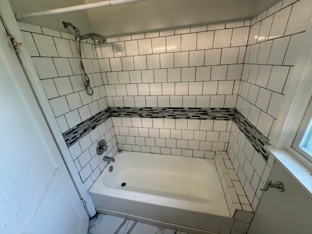 a bathroom with a bathtub