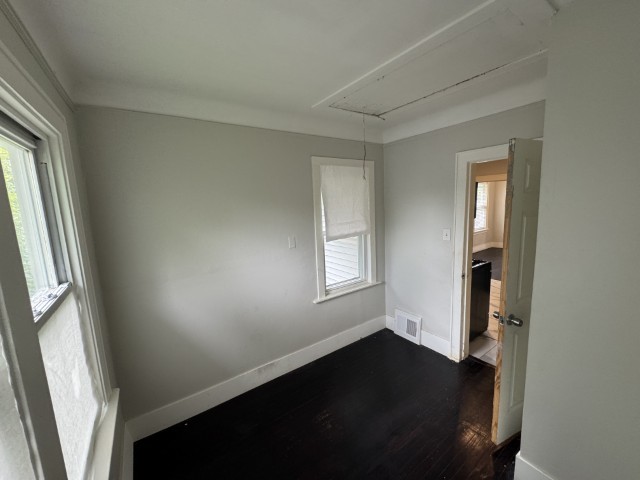 10117 South Perry Avenue Chicago, IL 60628 - Photo 22 of 33 an empty room with windows