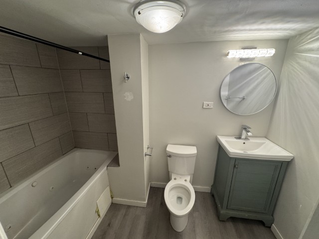 10117 South Perry Avenue Chicago, IL 60628 - Photo 30 of 33 a bathroom with a sink toilet and shower