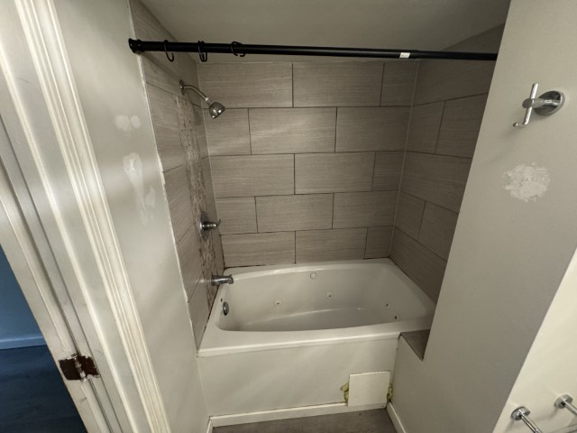 10117 South Perry Avenue Chicago, IL 60628 - Photo 31 of 33 a white bath tub sitting next to a shower