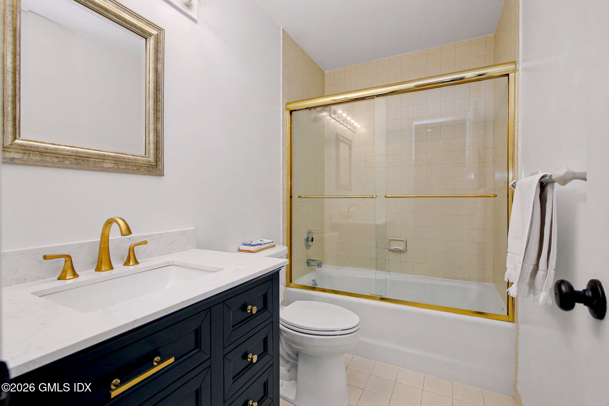 500 River Road, Unit 3 Cos Cob, CT 06807 - Photo 12 of 21 a bathroom with a sink a toilet and shower