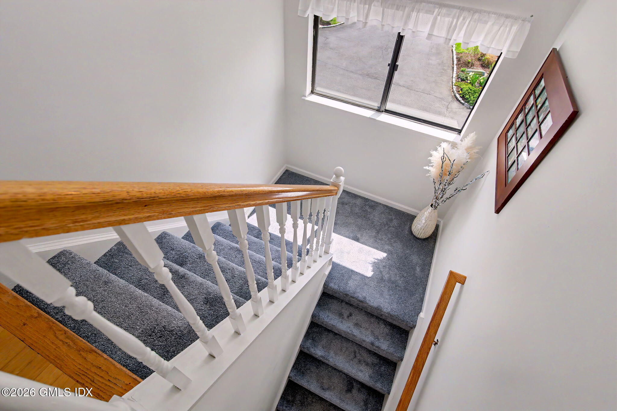 500 River Road, Unit 3 Cos Cob, CT 06807 - Photo 16 of 21 a view of entryway with wooden floor