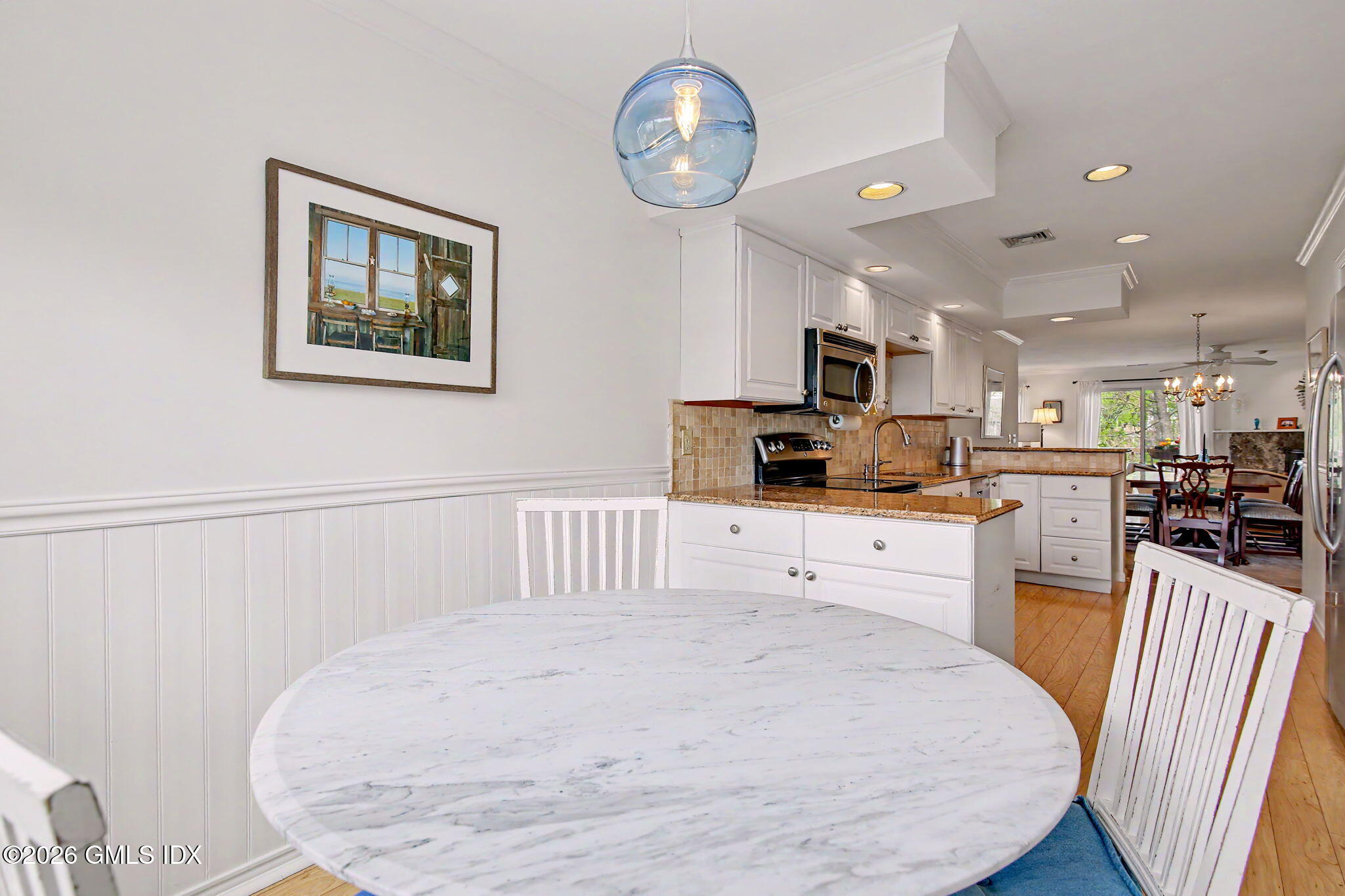500 River Road, Unit 3 Cos Cob, CT 06807 - Photo 2 of 21 a kitchen with a appliances cabinets and a counter top space