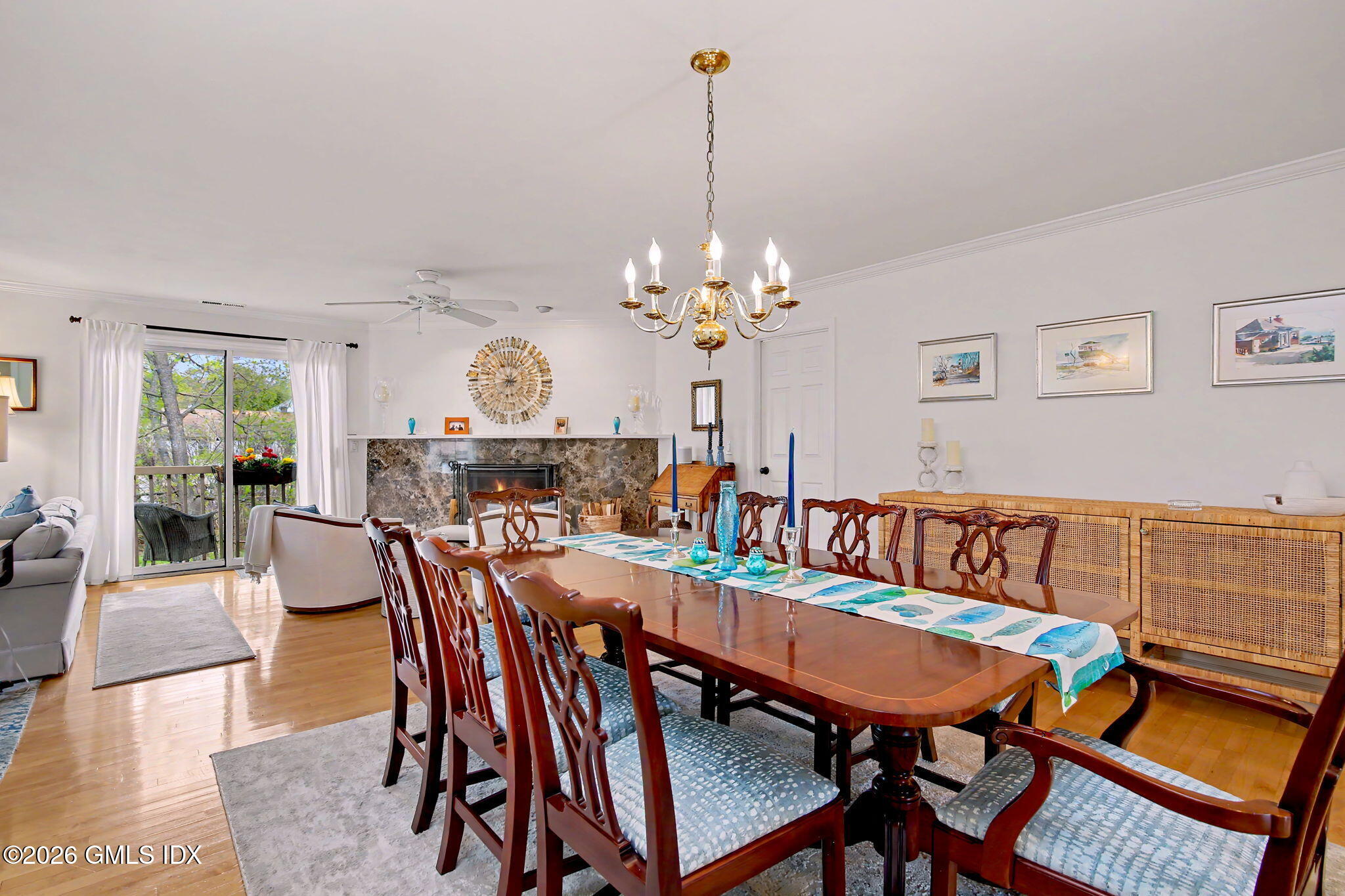 500 River Road, Unit 3 Cos Cob, CT 06807 - Photo 5 of 21 a view of a dining room with furniture and chandelier