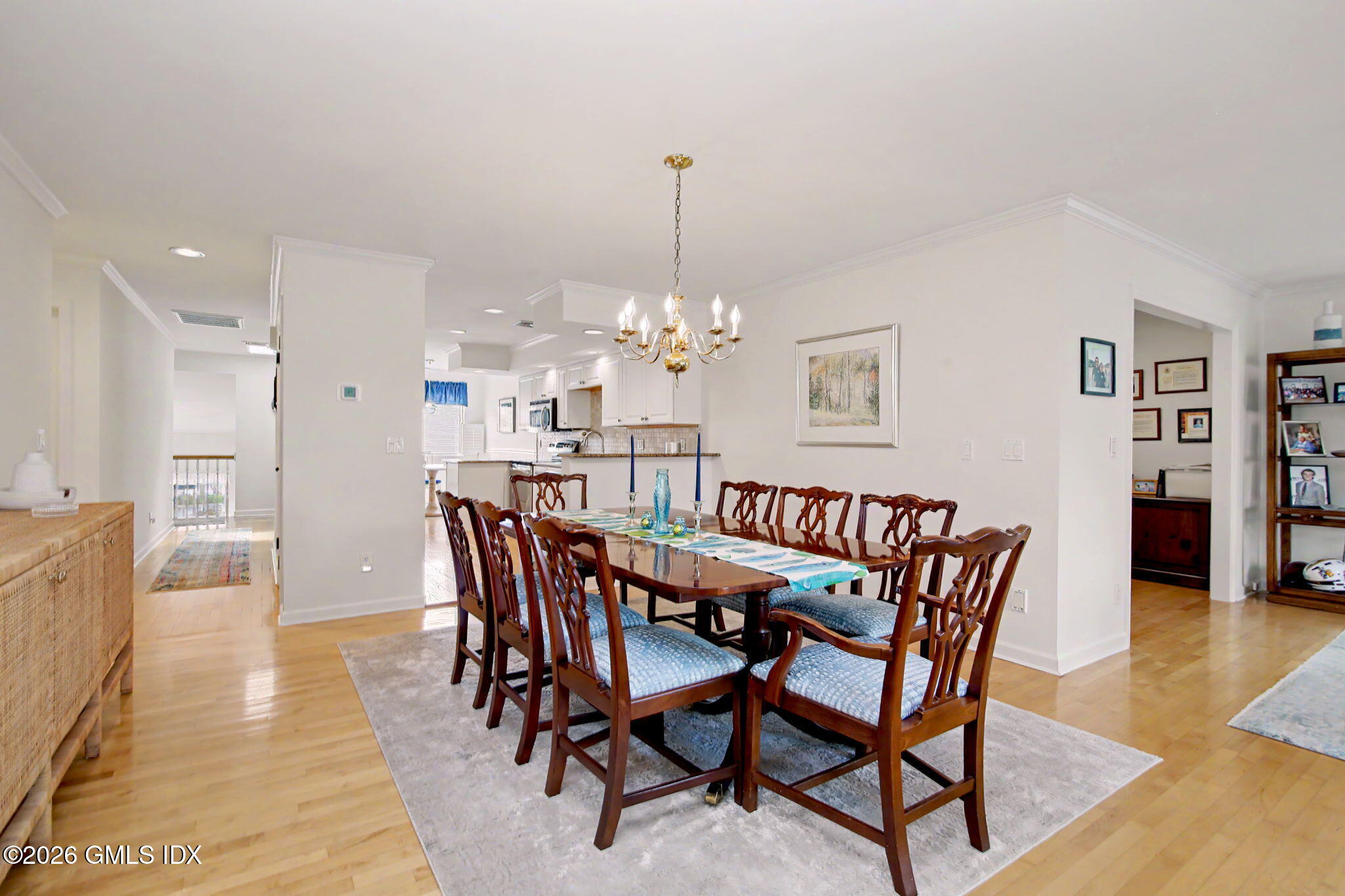 500 River Road, Unit 3 Cos Cob, CT 06807 - Photo 6 of 21 a view of a dining room with furniture and wooden floor