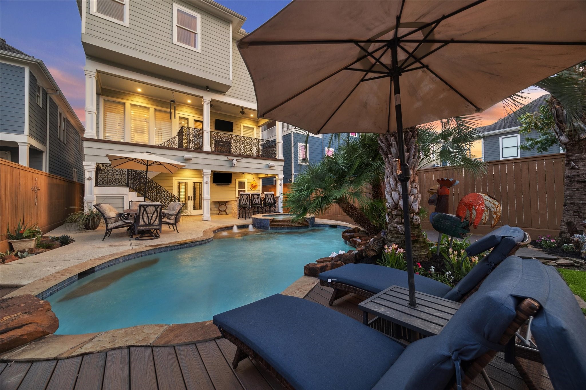 a view of a swimming pool with a patio