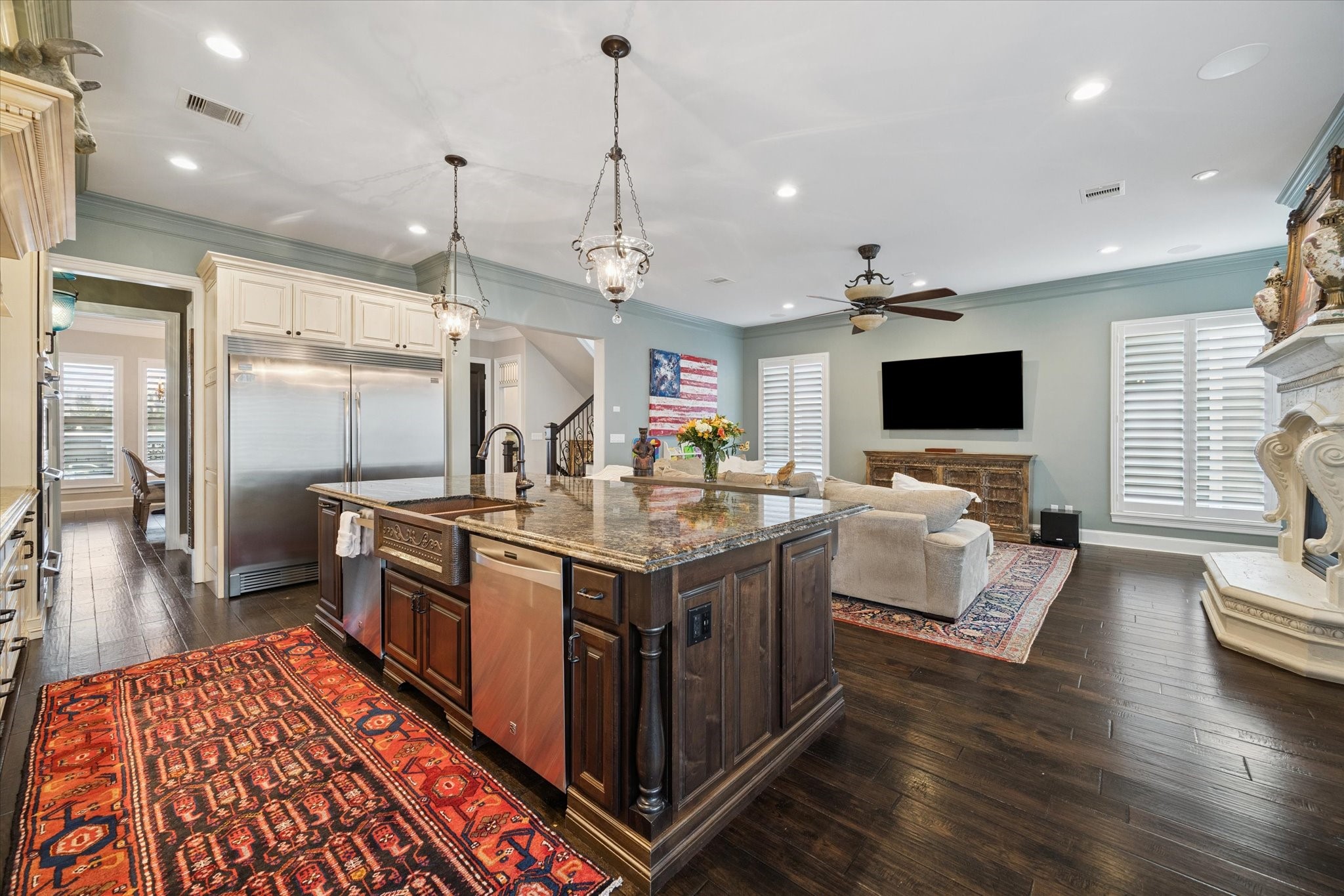 205 West 24th Street Houston, TX 77008 - Photo 9 of 32 a kitchen with stainless steel appliances granite countertop a stove and a wooden floors