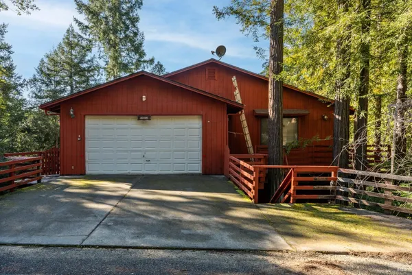 a view of a house with a garage
