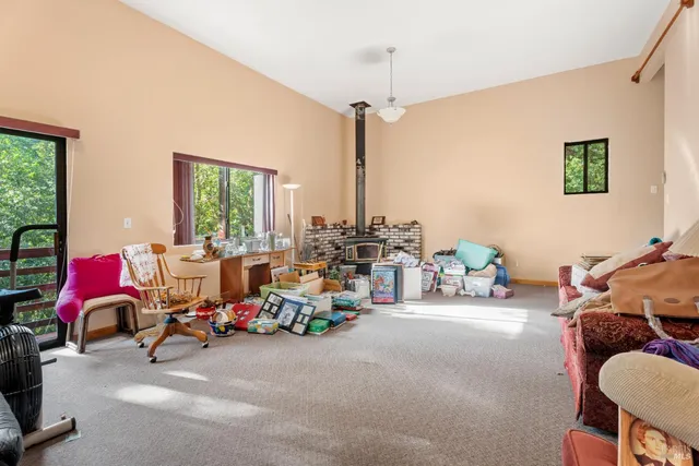 a bedroom with furniture and a chandelier