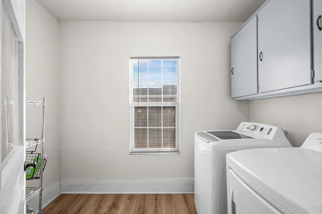 a view of storage and utility room with washer and dryer
