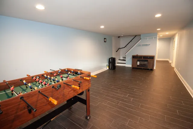 a room with furniture and wooden floor