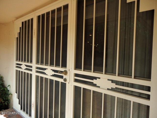 18509 Poco Vista Rio Verde, AZ 85263 - Photo 34 of 39 Security doors on entries to home