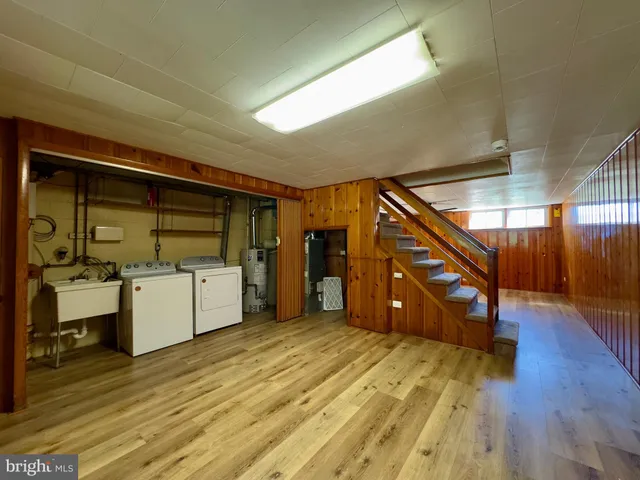 a view of a hallway with stairs