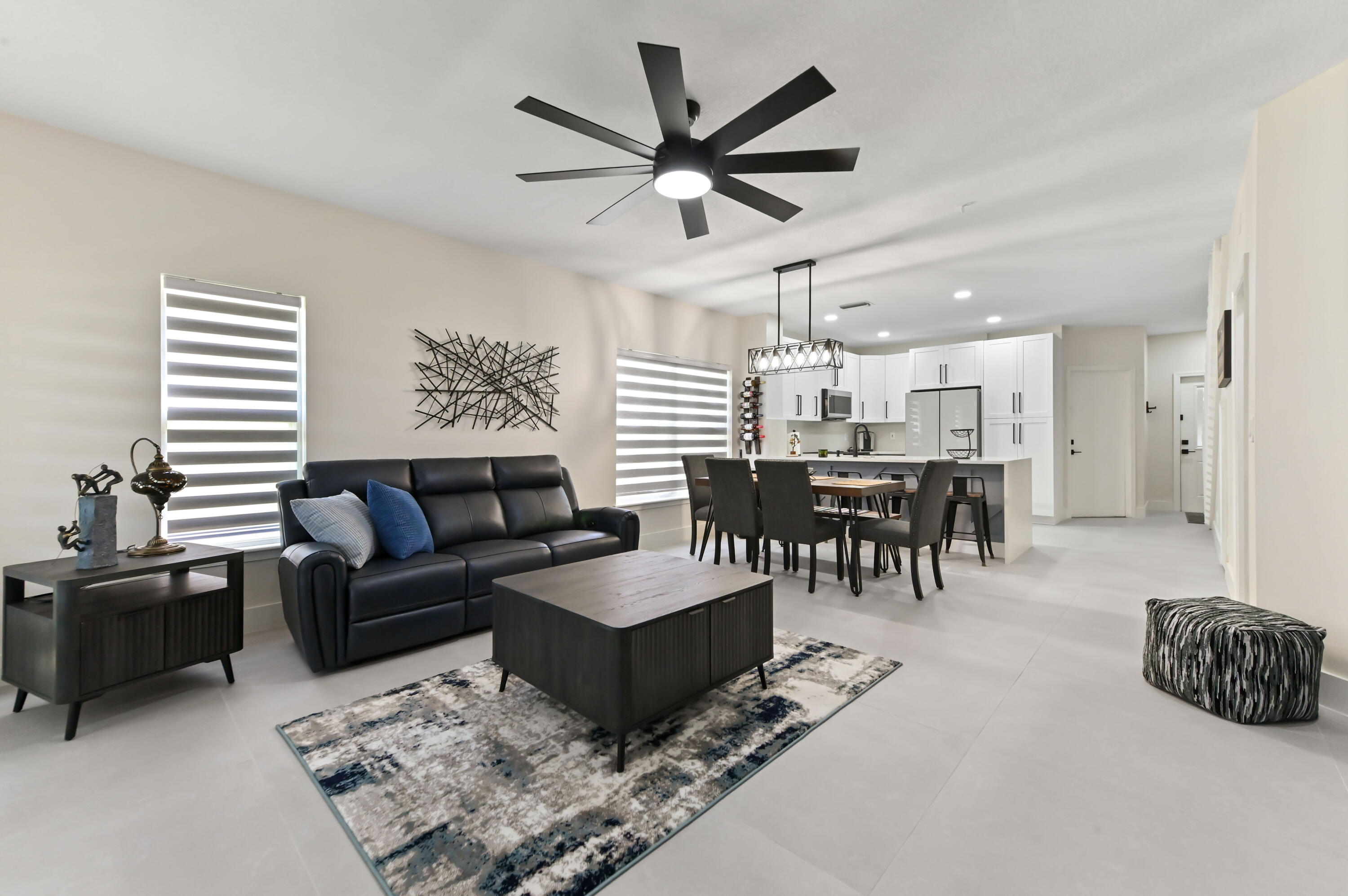 6880 Brook Hollow Road Lake Worth, FL 33467 - Photo 6 of 31 a living room with furniture and a table
