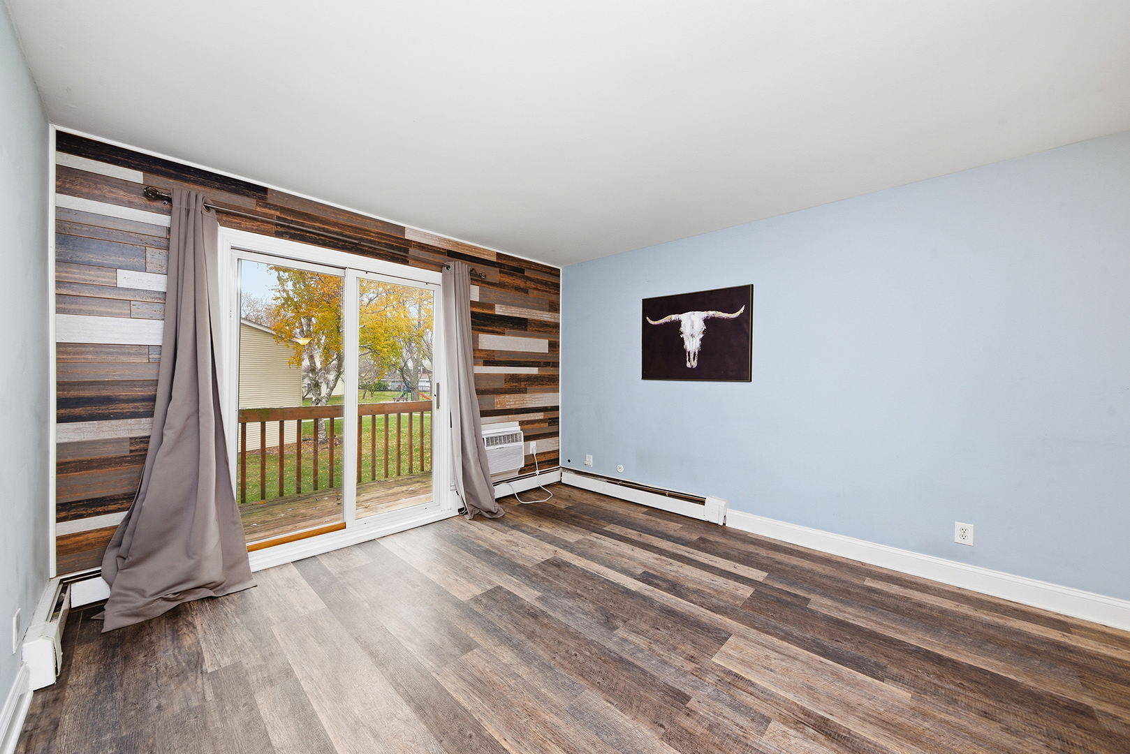 2300 Light Road, Unit 209 Oswego, IL 60543 - Photo 5 of 12 a view of an empty room with a window