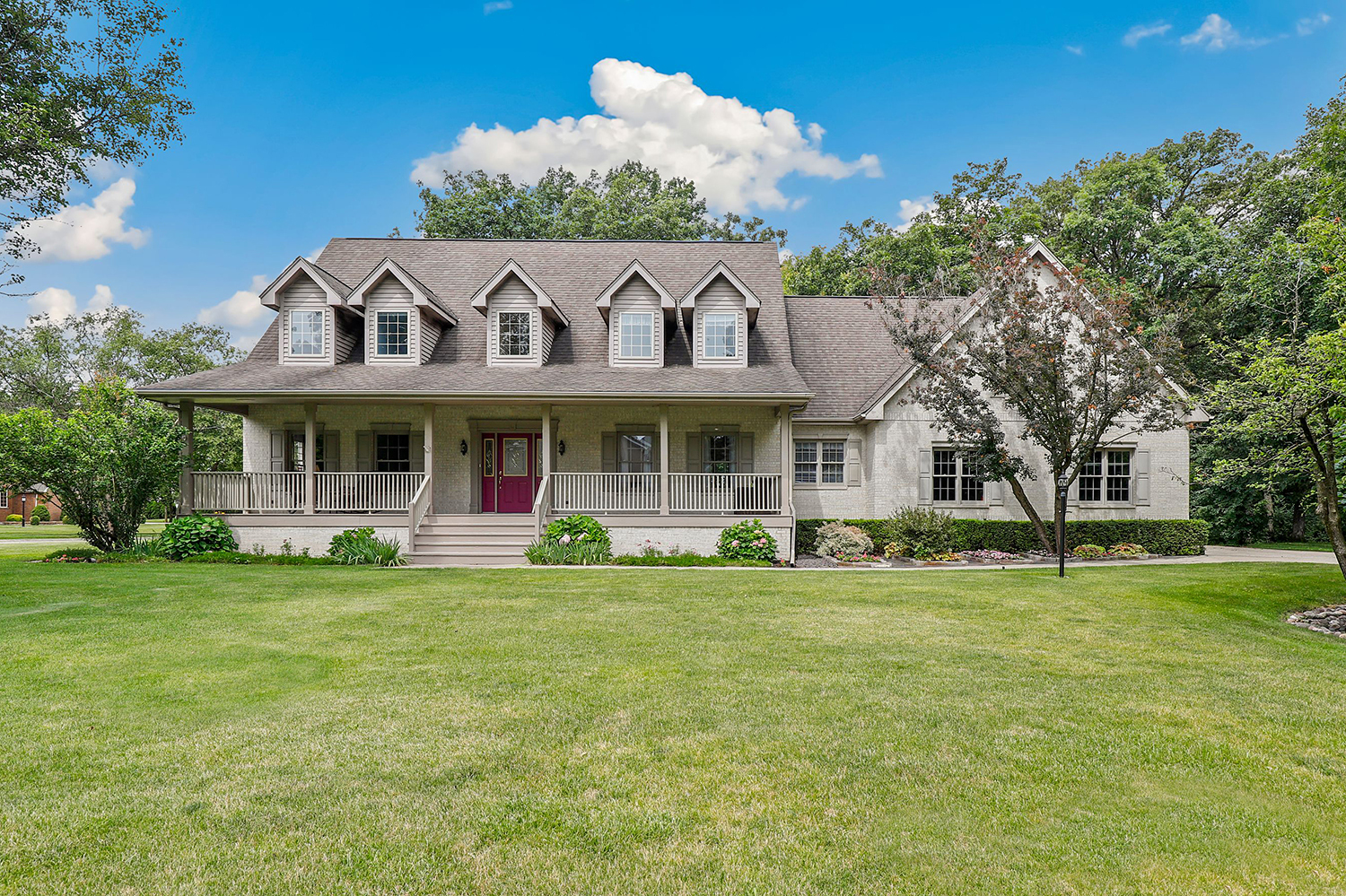 3048 Brampton Lane Dyer, IN 46311 - Photo 1 of 46 a view of a house with a garden and porch